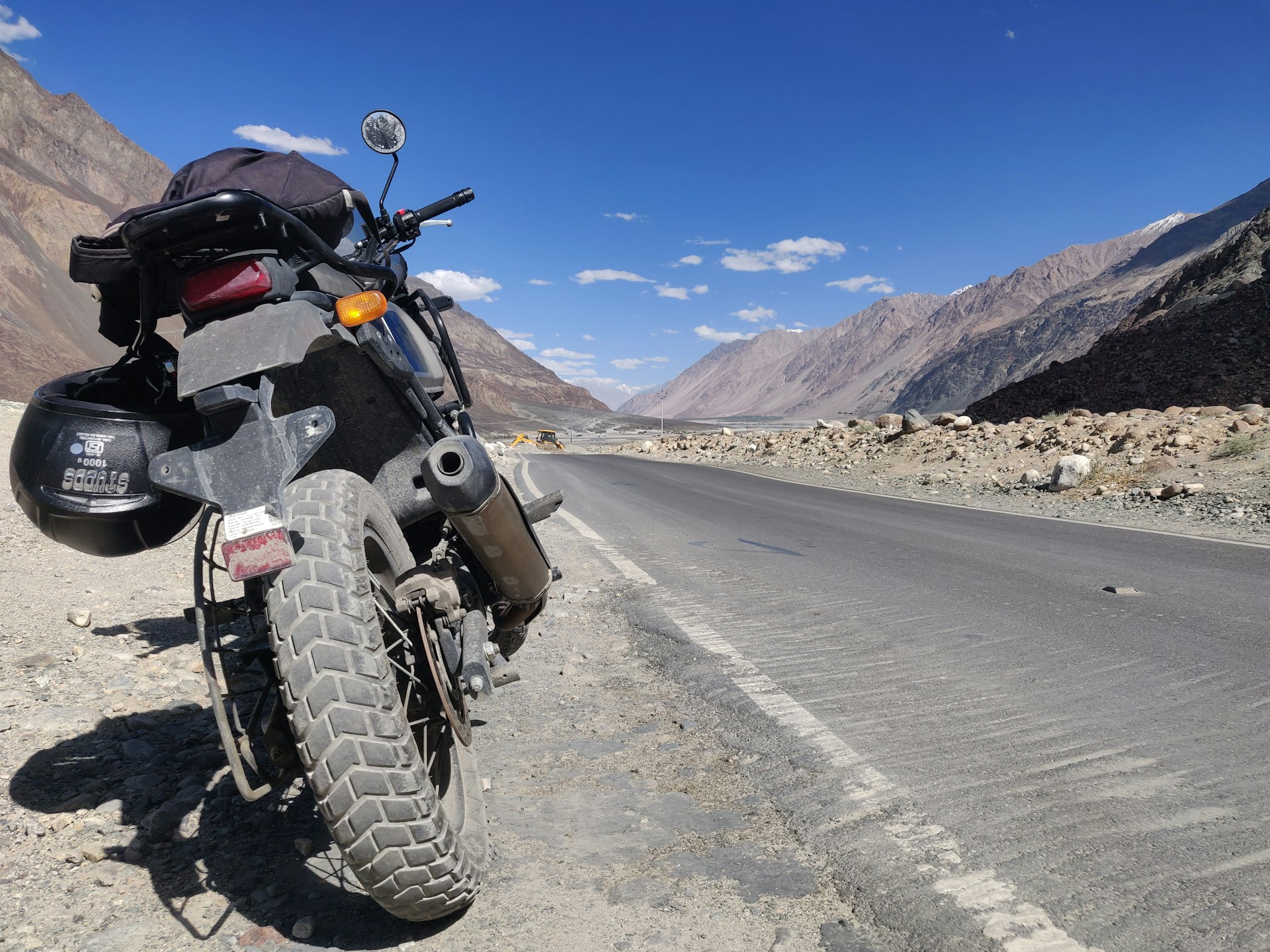 a motorcycle parked on the side of the road